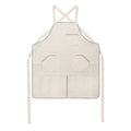 Handmade, quilted cotton canvas chef's apron with pure flax linen trim and back panels, featuring octagonal pockets, heavy duty cotton canvas straps, on a white background.
